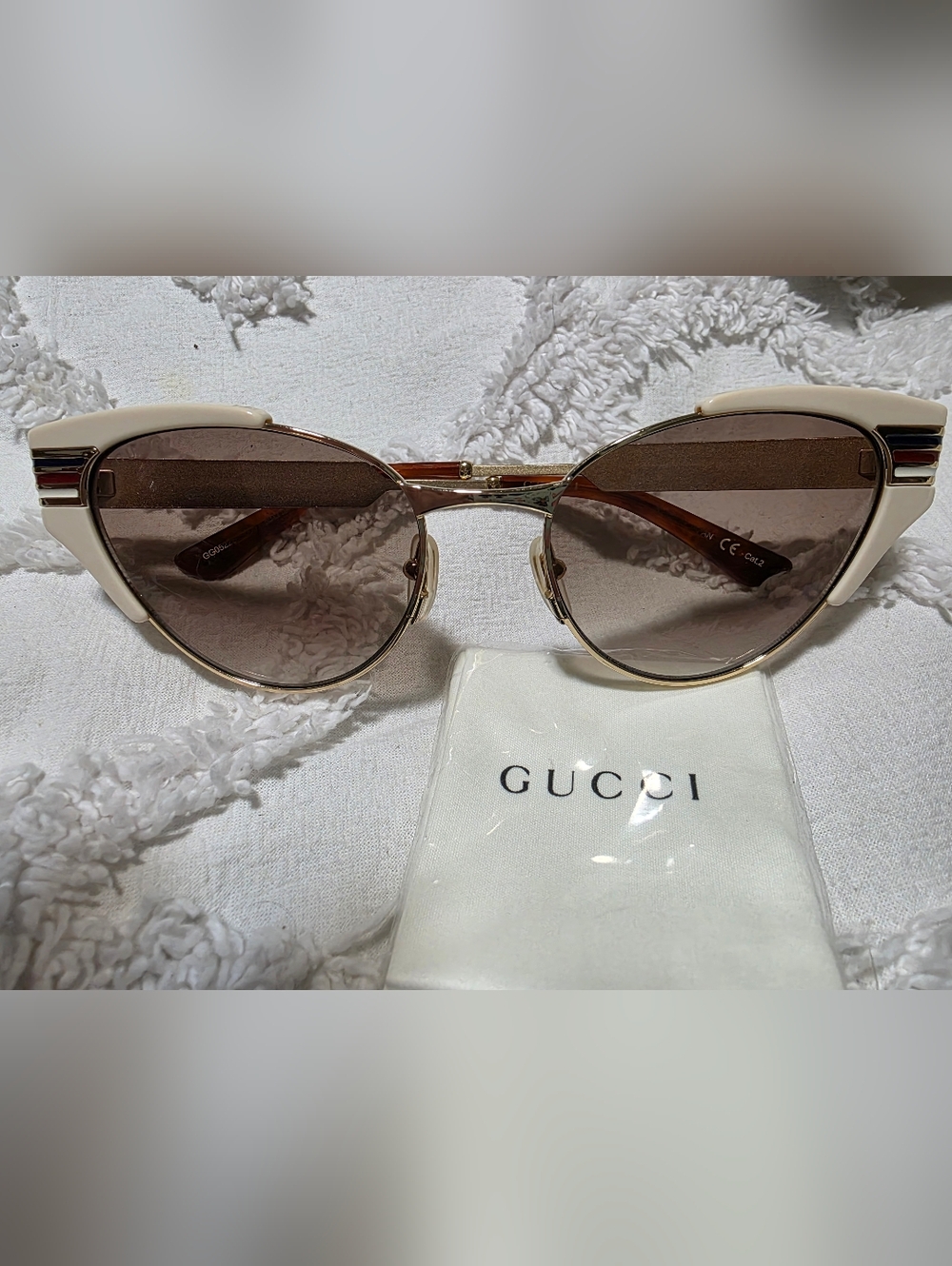 Gucci Cream Cat Eye Sunglasses with Brown Lenses